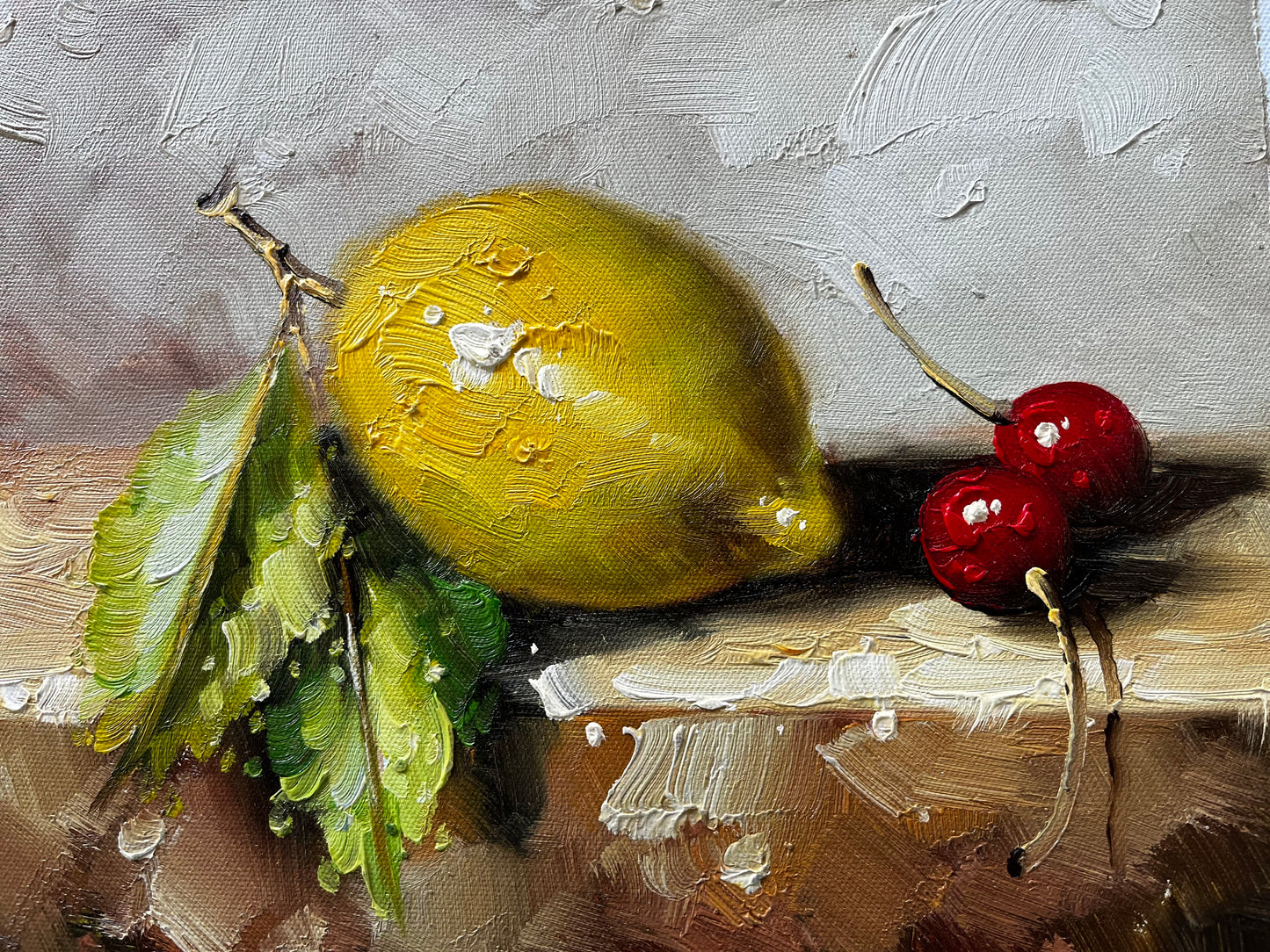 Nature morte d'un citron et de deux cerises