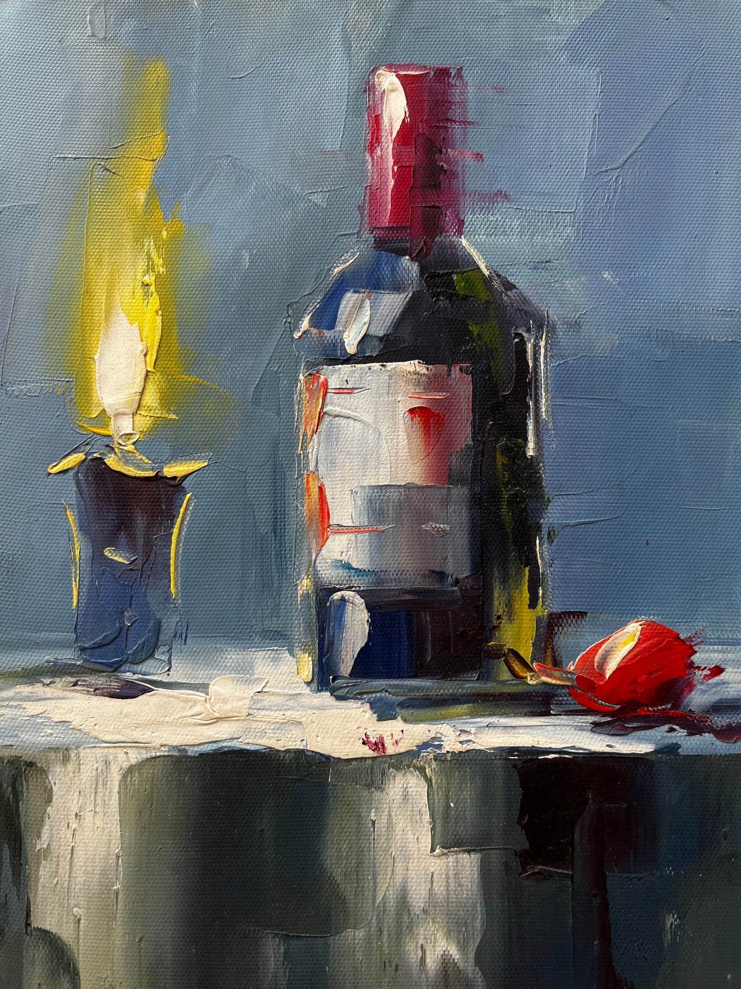 Nature morte d'une bougie et d'une bouteille