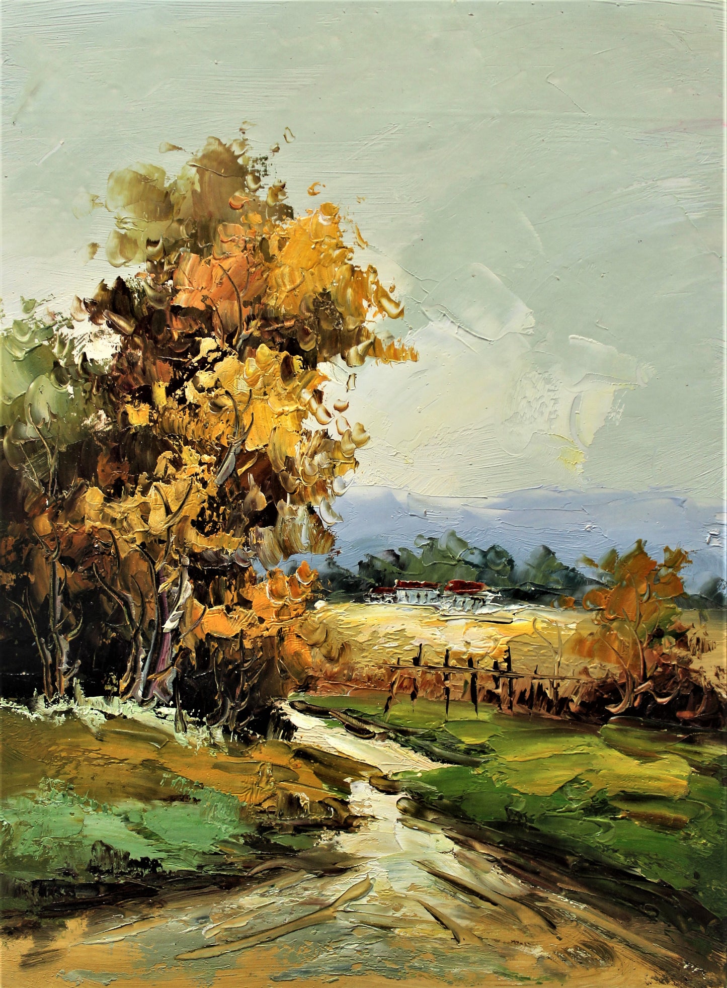 Country road with autumn trees