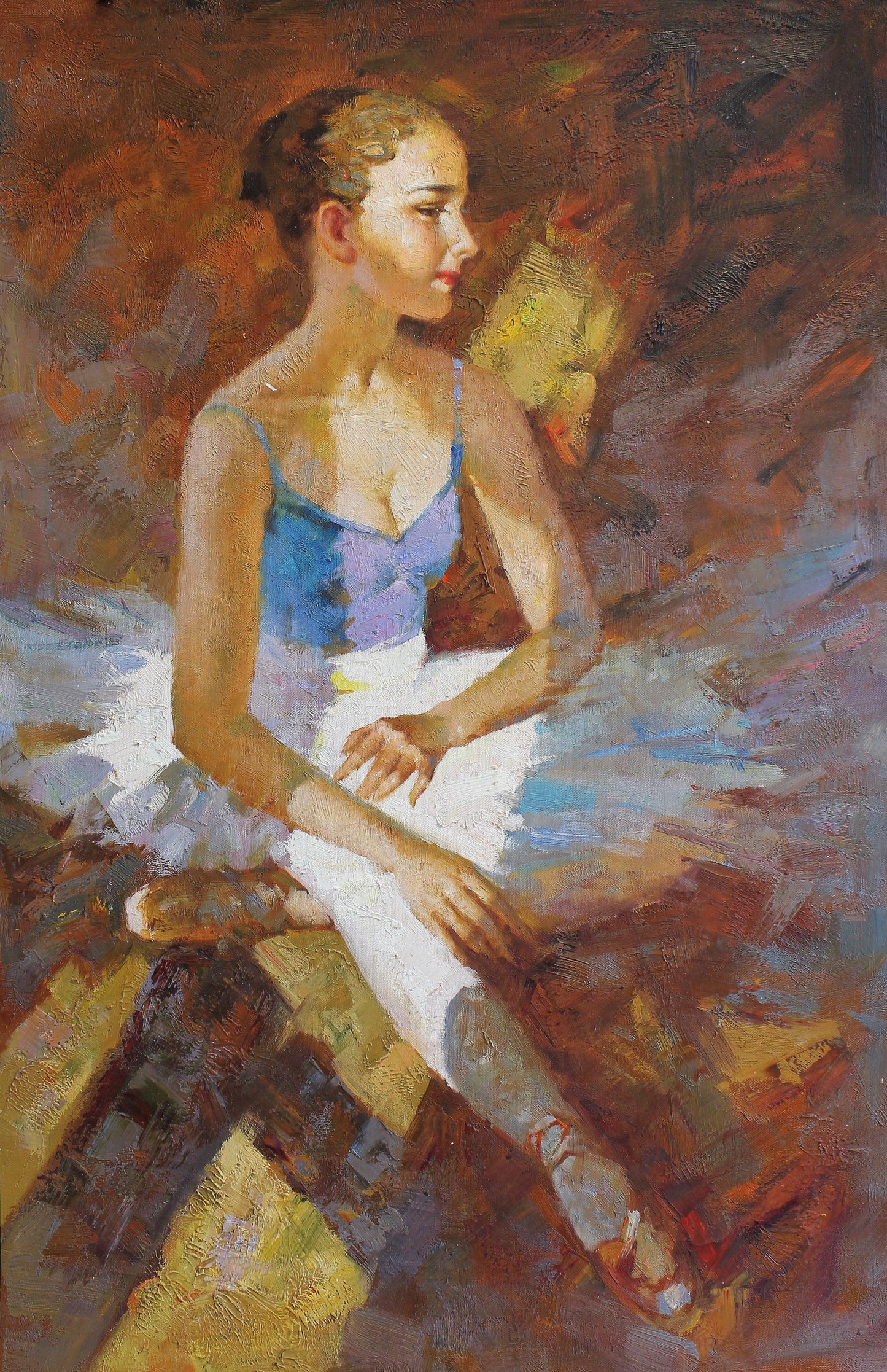 Ballerine assise sur le sol