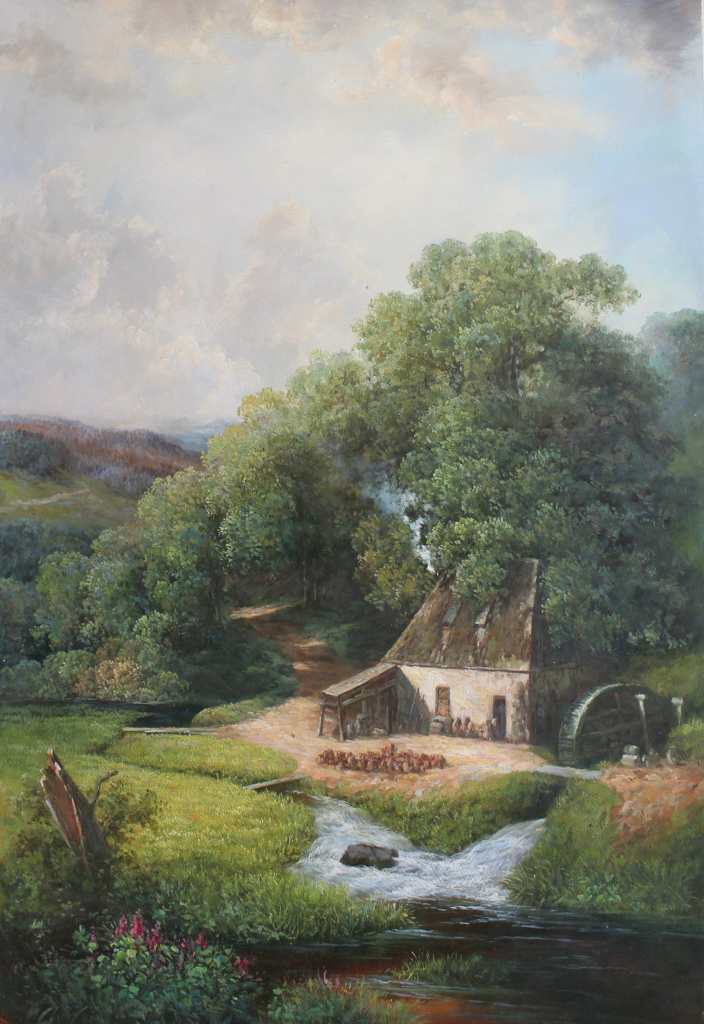 Petit bâtiment avec roue de moulin à eau