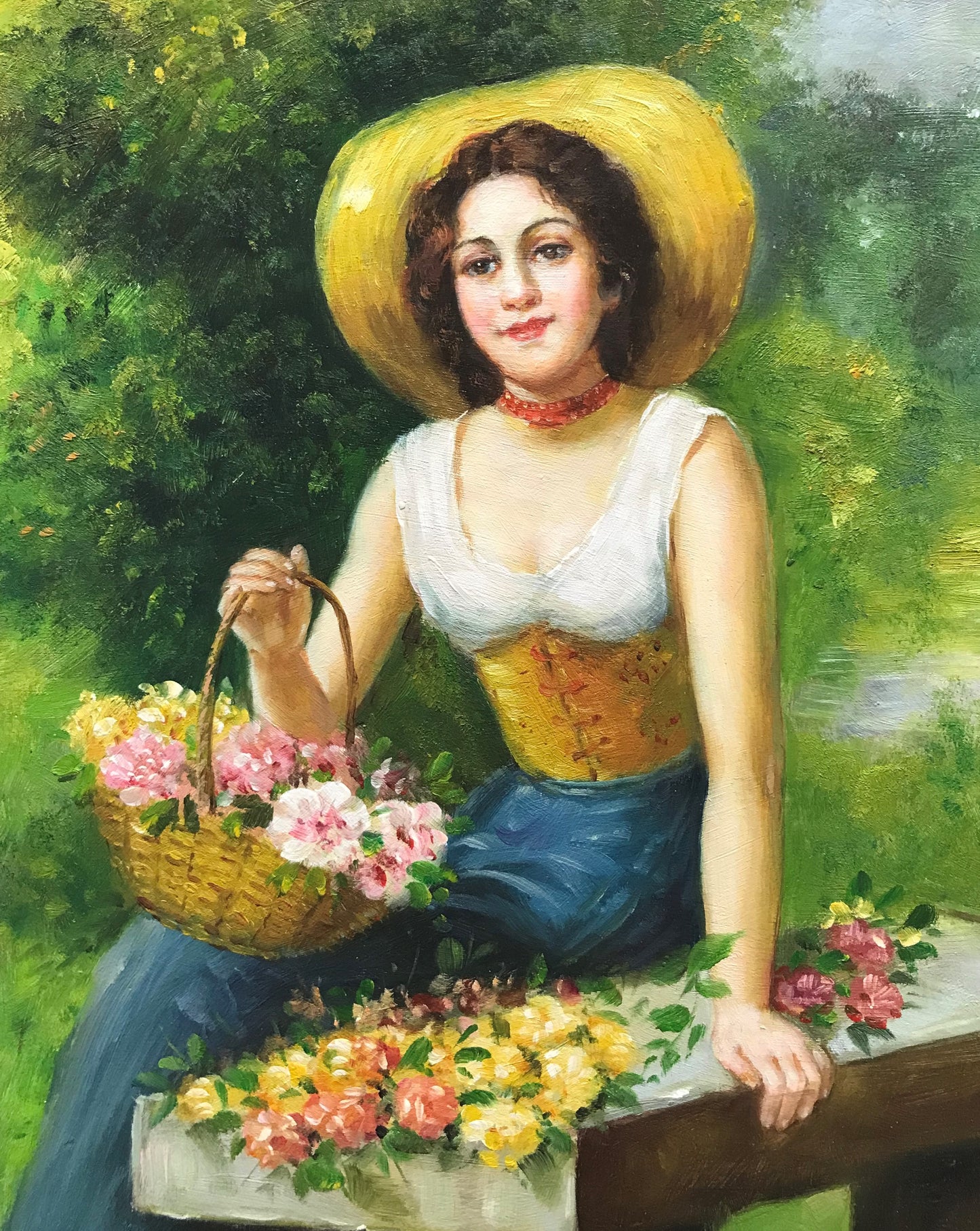 Femme assise avec un panier de fleurs
