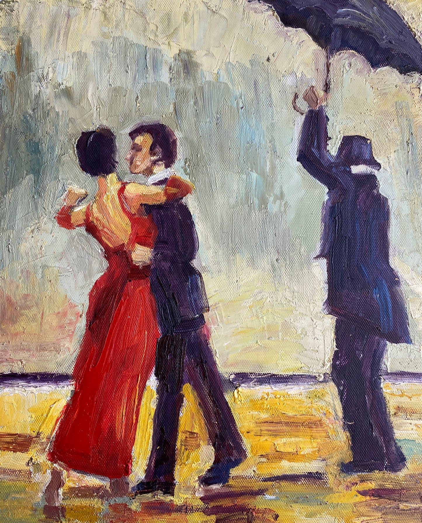 Couple dansant sous la pluie