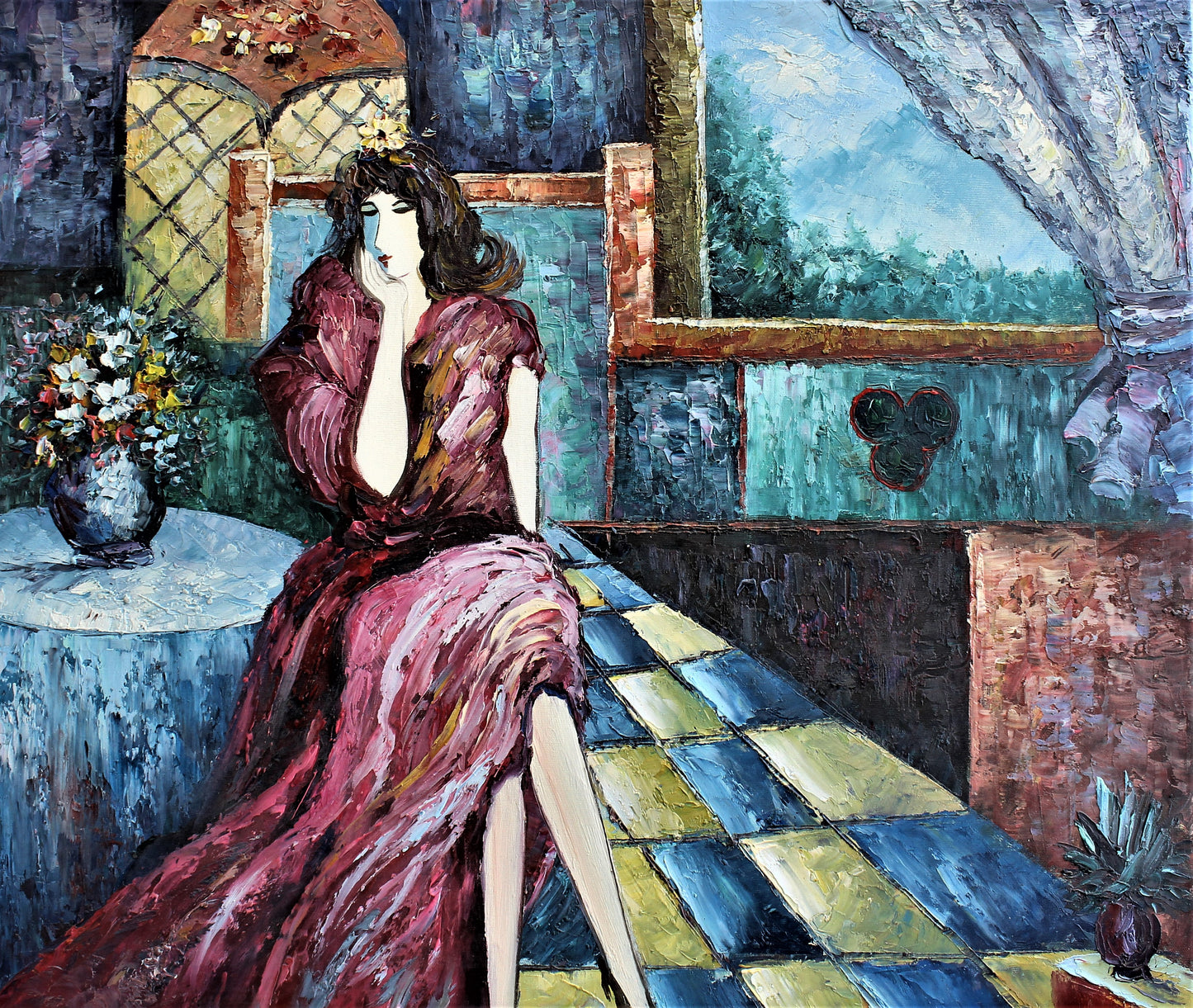 Femme en robe rouge assise à une table