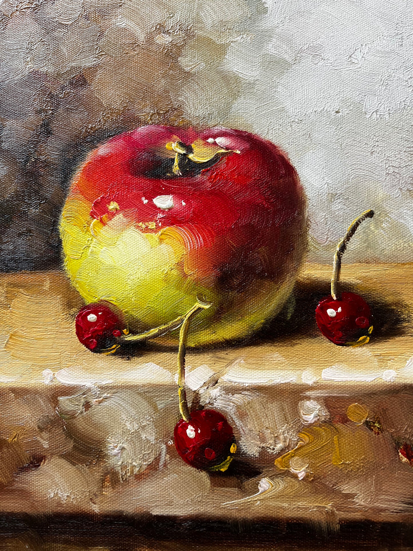 Nature morte d'une pomme et de cerises