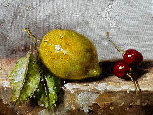 Nature morte de deux cerises et d'un citron