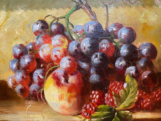 Nature morte de framboises, de raisins et d'une pomme
