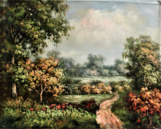 Green landscape with cloudy sky