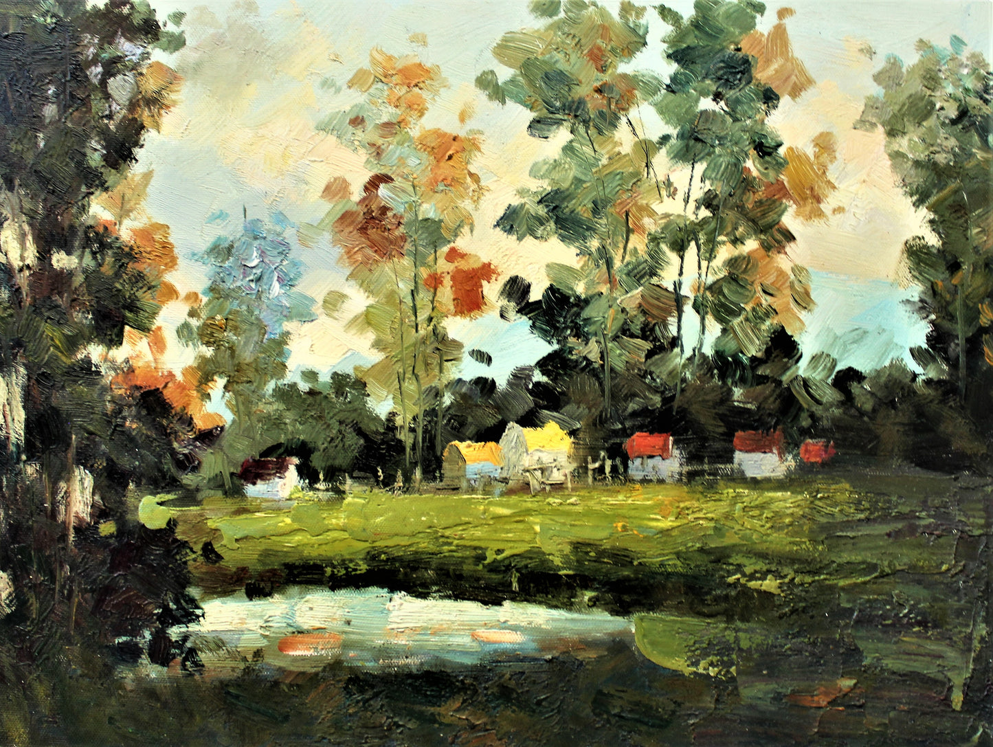 Petites maisons au bord d'un étang