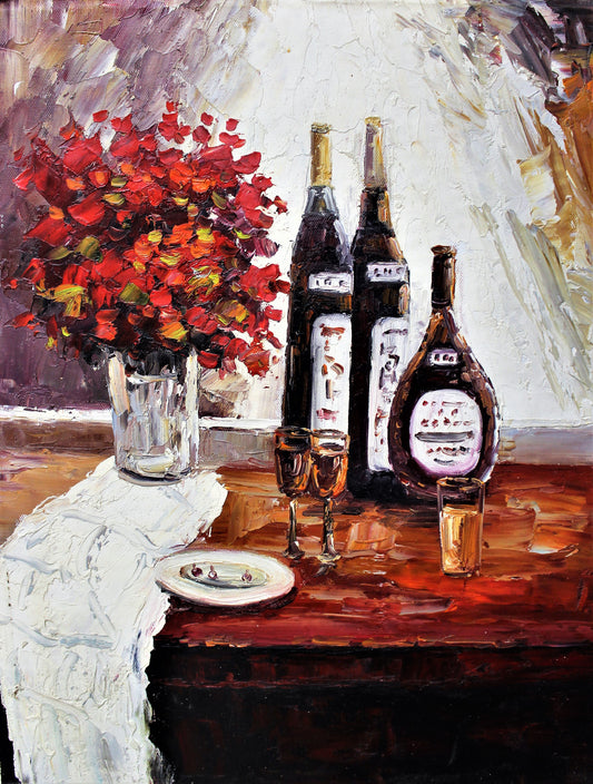 Still life of flowers, glasses and bottles of alcohol