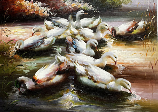 Ducks with their beaks underwater
