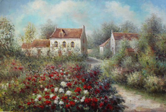 Chemin à travers la prairie vers les maisons