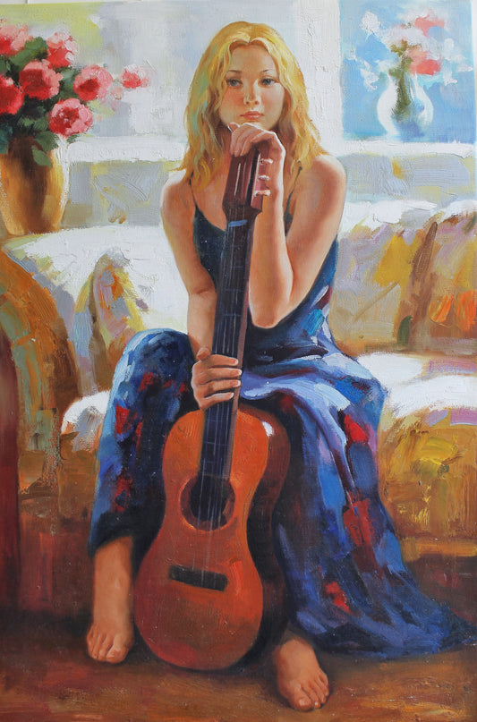 Femme blonde avec guitare