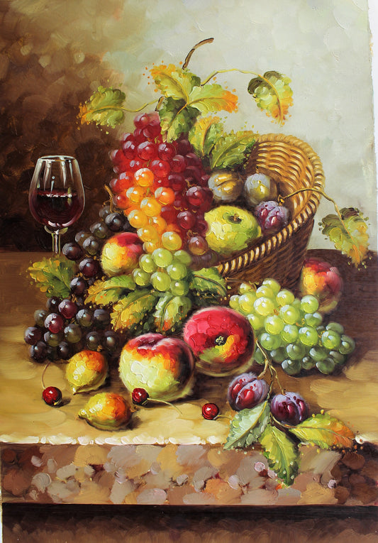 Nature morte de fruits dans un panier tressé et un verre de vin