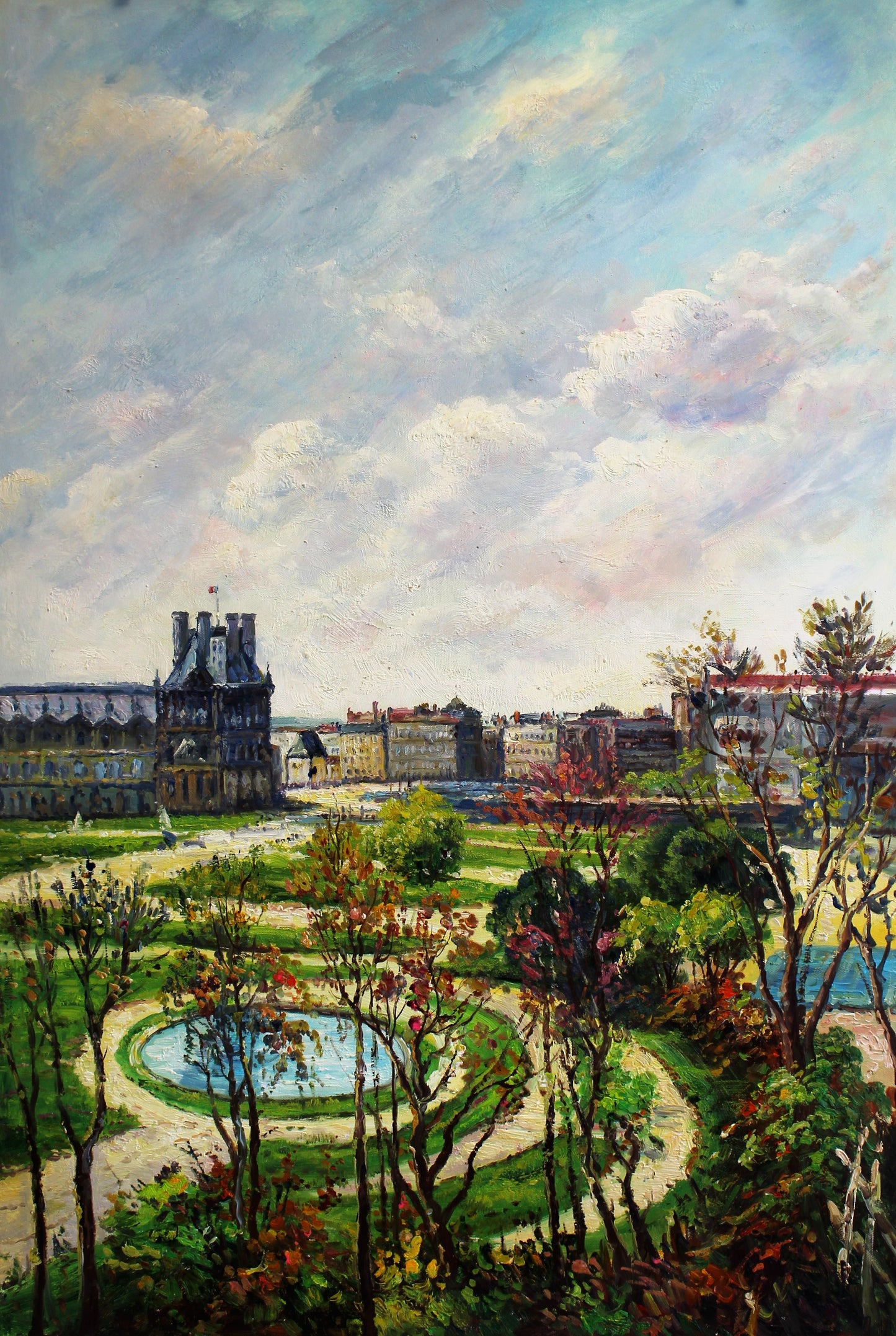 Vue aérienne du jardin avec étang et bâtiments au loin