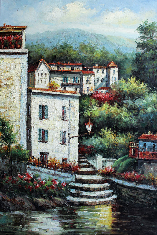 Petite ville avec des marches menant à un étang