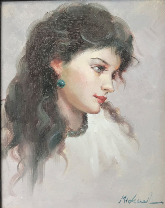 Portrait de profil d'une femme portant des bijoux
