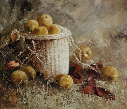 Nature morte de pommes jaunes dans un panier