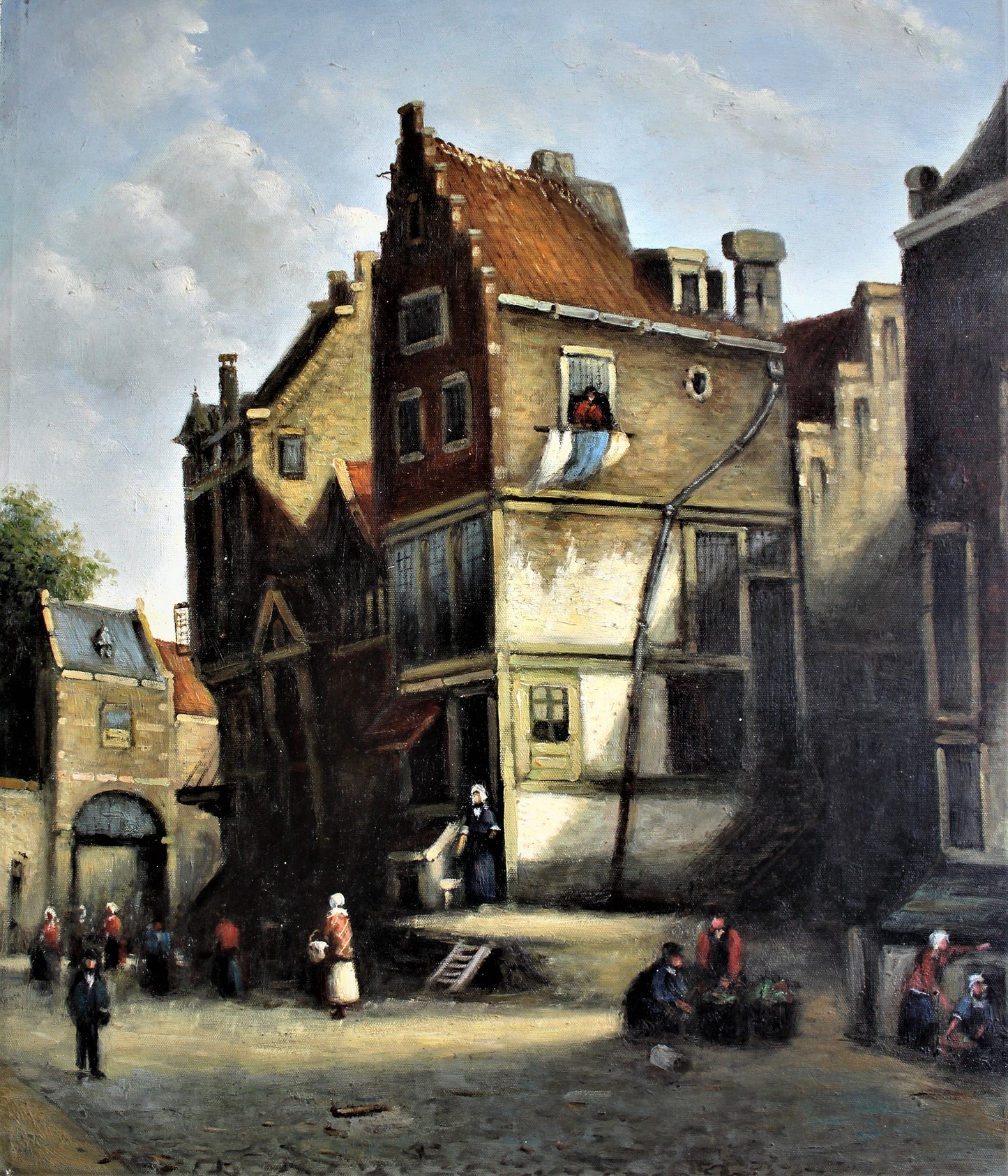 Personnages jouant et séchant du linge dans une vieille rue