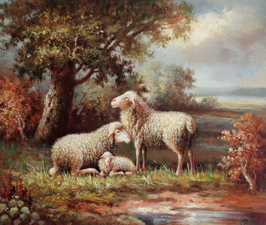 Deux moutons et un agneau dans un pré