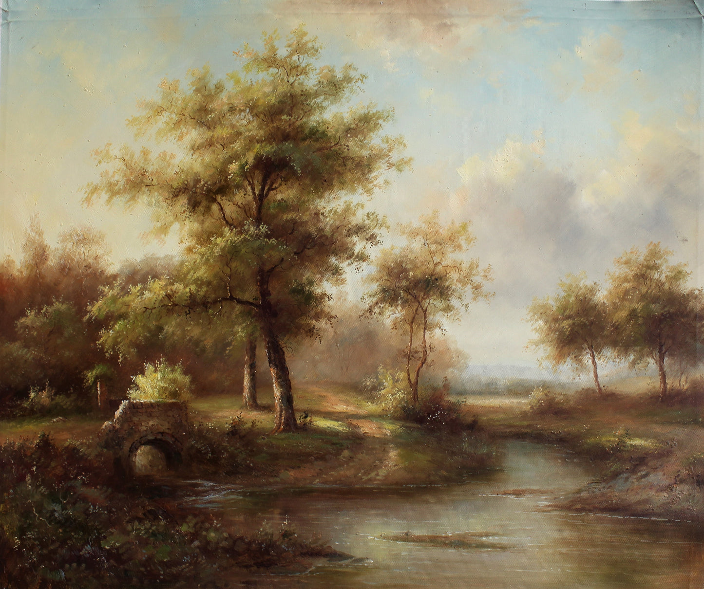 Rivière sinueuse avec petit pont de pierre