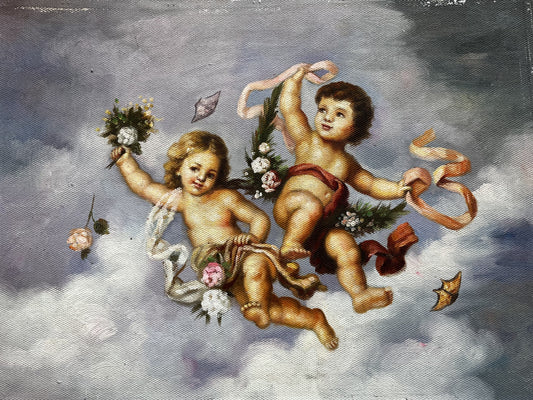 Two cherubs in the sky