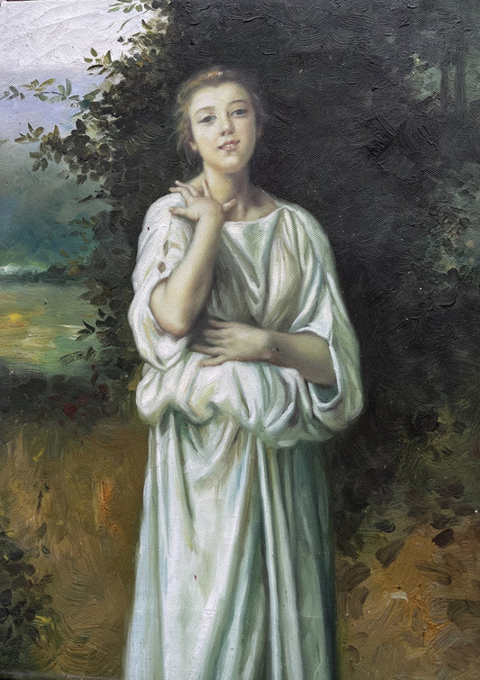 Woman in forest wearing white gown
