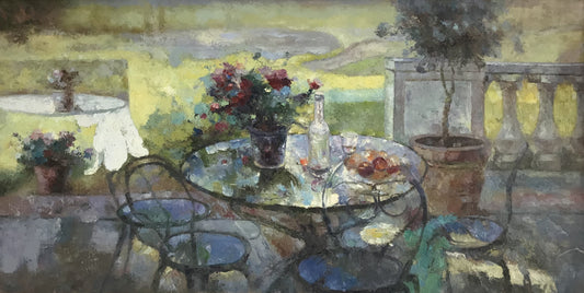 Table à manger d'extérieur avec fruits et fleurs
