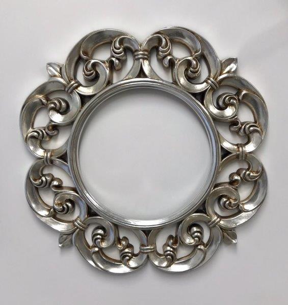 Silver ornate circular frame mirror