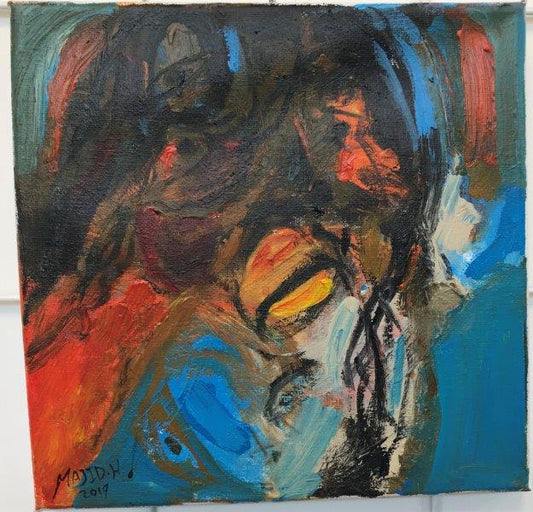 Visage abstrait en orange, bleu et marron